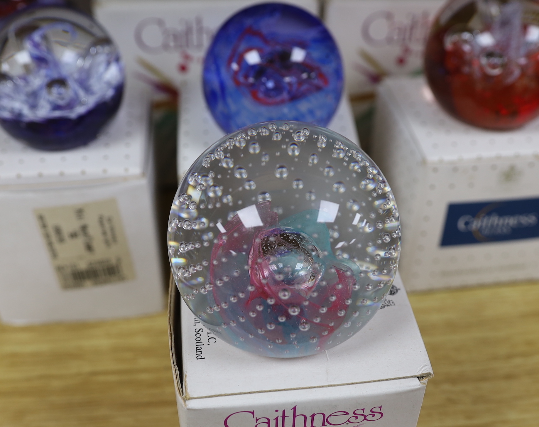 Ten Caithness paperweights, boxed, some limited edition